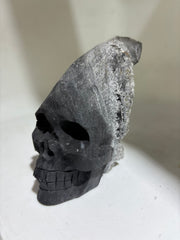 Obsidian Crest Calcite SkullCrystal Sculpture with Natural Frosted Finish