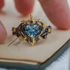 Thorned Rose Alloy Ring with Blue Crystal