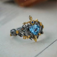 Thorned Rose Alloy Ring with Blue Crystal