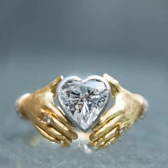 Heart in Hands Zirconia Ring