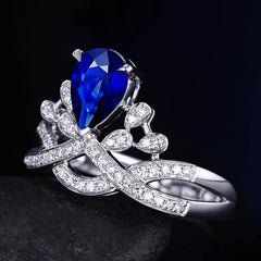 Elegant Blue Teardrop Zircon Alloy Ring with Pave CZ Accents