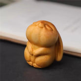 Hand-Carved Boxwood Bunny Figurine Set