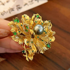 Luxury Gold Floral Brooch with Green Gemstones and Pearl