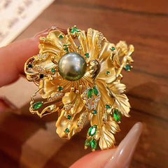 Luxury Gold Floral Brooch with Green Gemstones and Pearl