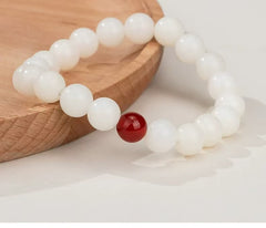 Elegant White Jade Bead Bracelet with Red Agate Accent