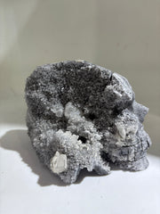 Calcite Skull with Engraved Feather Motif – Unique Crystal Stone Sculpture