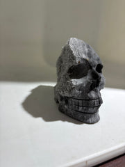 Dual-Tone Calcite Crystal Skull Stone Sculpture with Natural Quartz Cluster