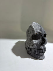 Dual-Tone Calcite Crystal Skull Stone Sculpture with Natural Quartz Cluster