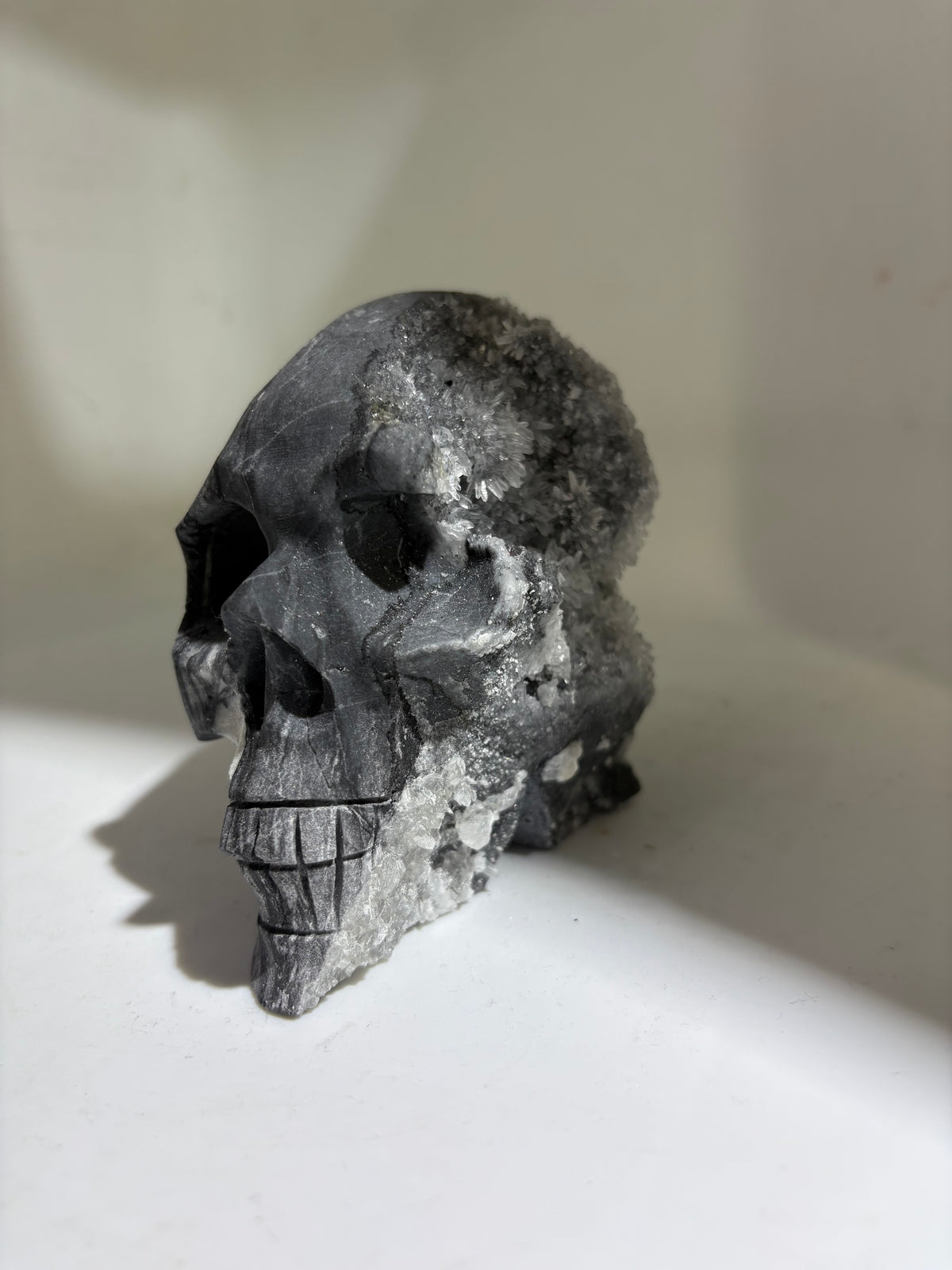 Shadow Frost Calcite Crystal Skull with Raw Druzy Back