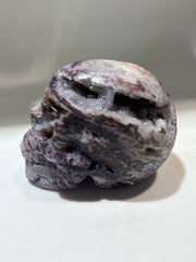 Twilight Vein Energy Gem Fluorite Skull – Hand-Carved Crystal Skull with Raw Violet Striations &amp; Primal Design