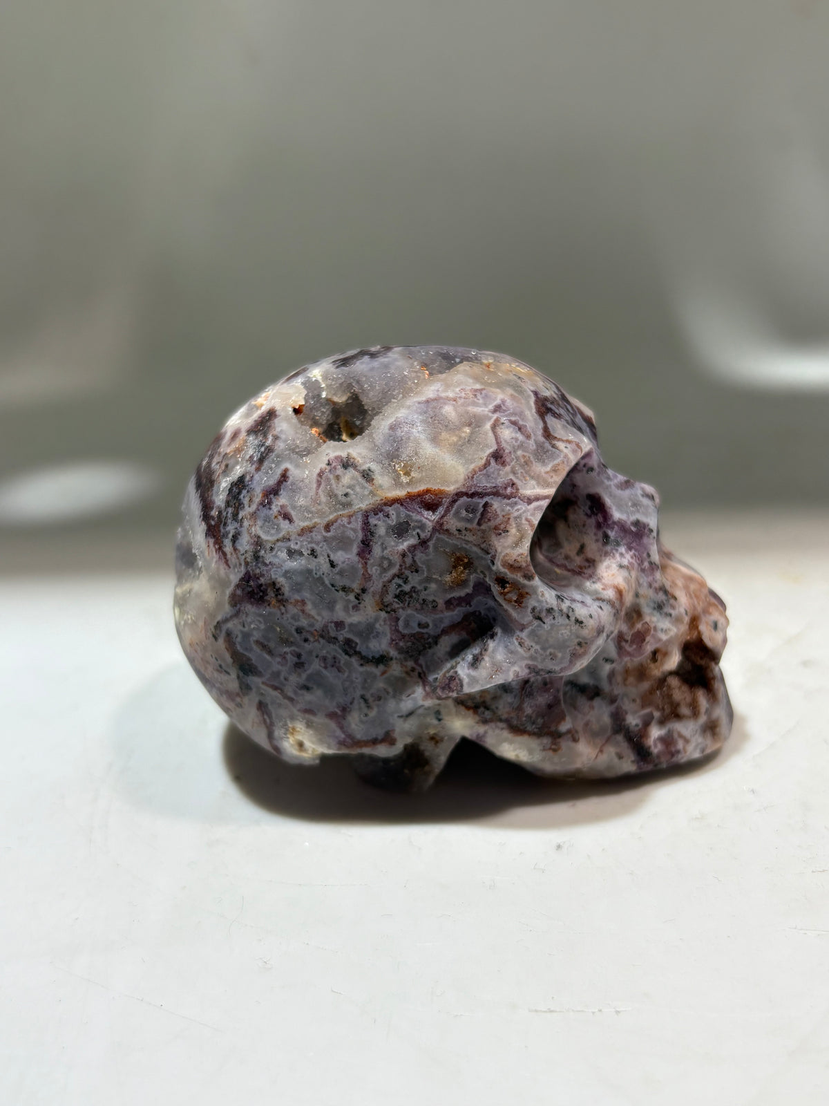 Energy Gem Fluorite Skull – Hand-Carved Natural Crystal Skull with Raw Geode Accents