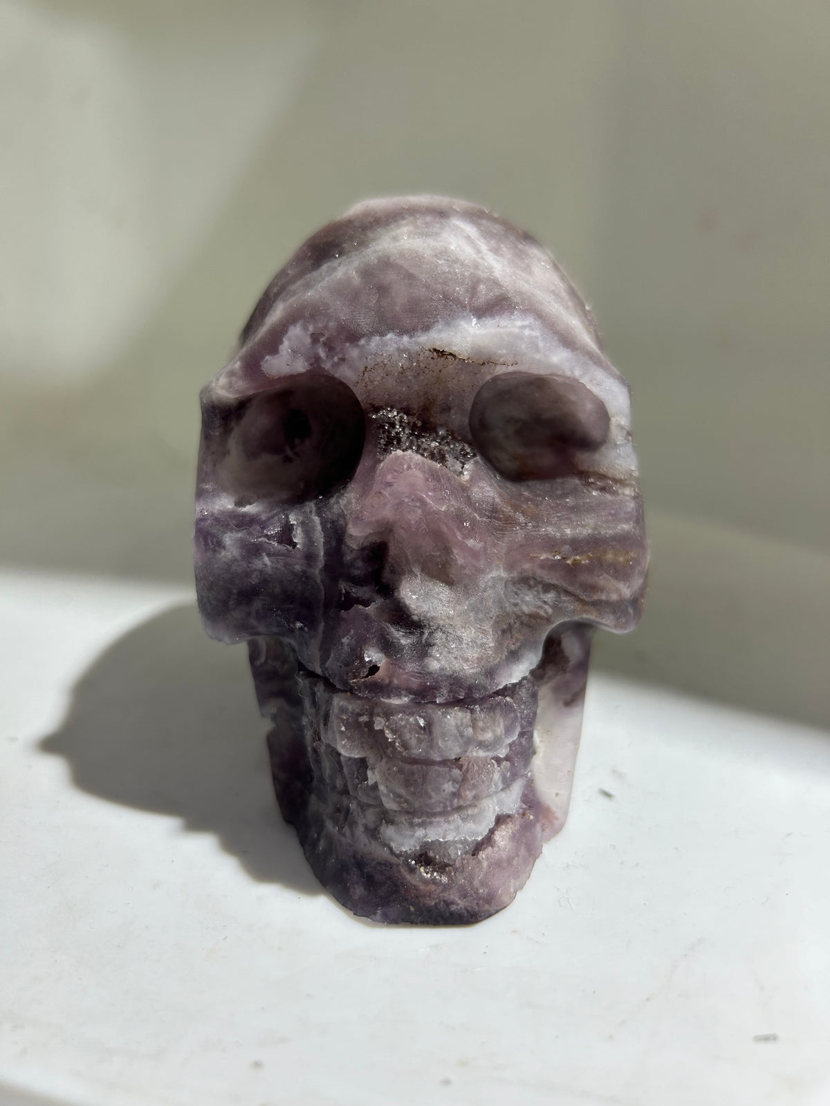 Ethereal Amethyst Vein Fluorite Skull – Hand-Carved Crystal Art Sculpture