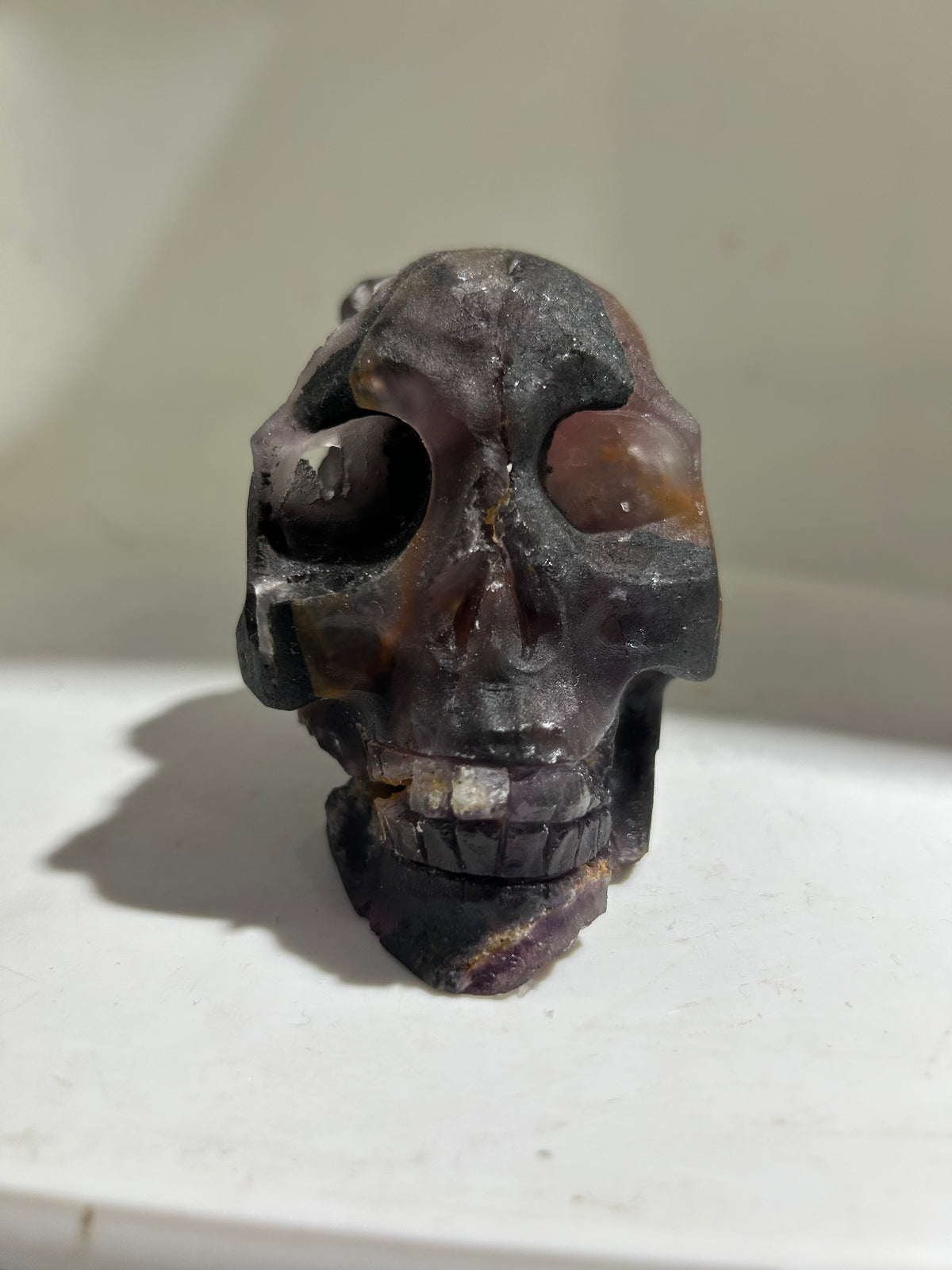 Obsidian Veins Fluorite Skull – Raw Crystal Art Sculpture