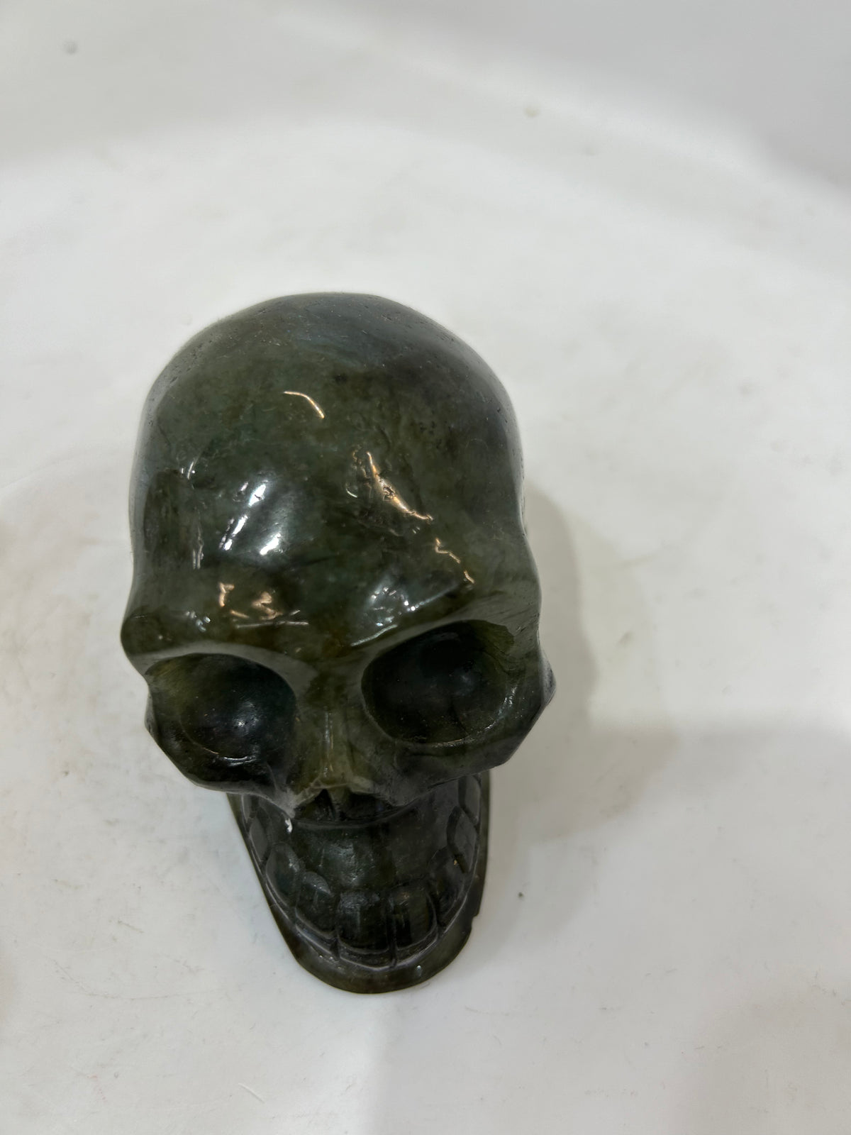Hand-HandCarved Spectrolite Skull Figurine