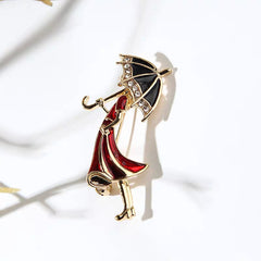 Red Dress Girl with Umbrella Brooch – Elegant Enamel Pin with Crystals